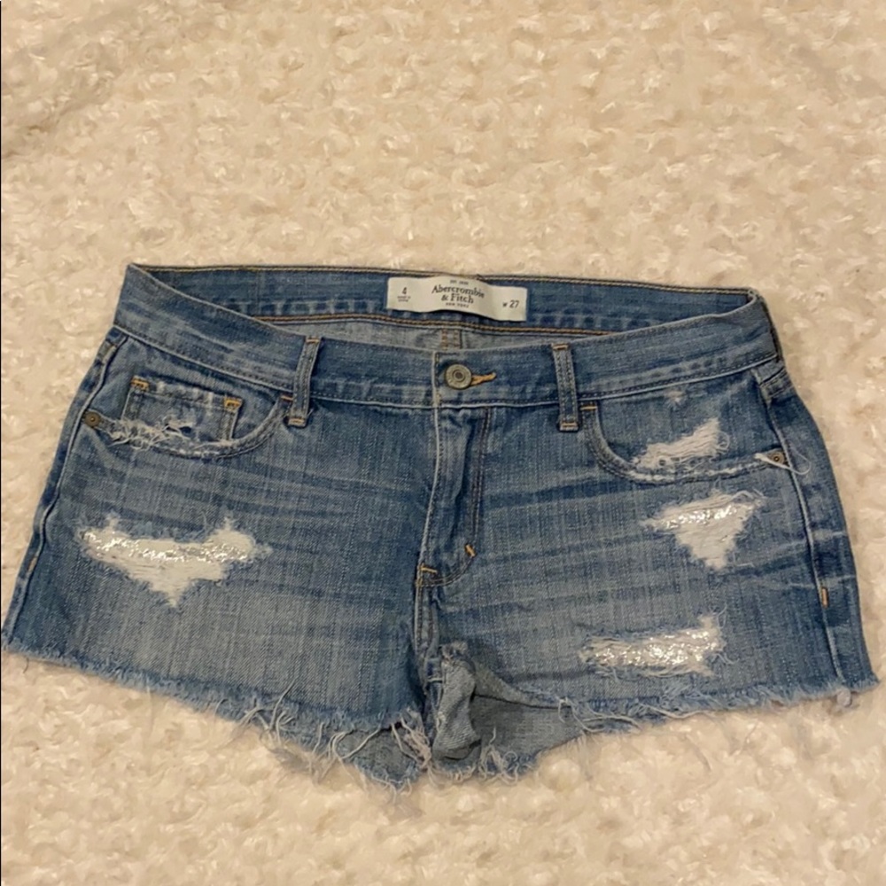 A&F distressed denim shorts with glitter accents